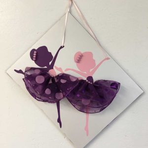 2 dancing girls in polka dot dresses. SOLD