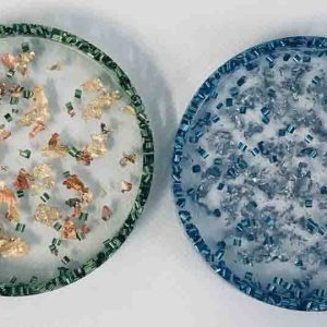 Pair of coasters in metal leaf flakes