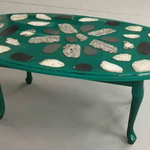 Oval coffee table in green anodized paint