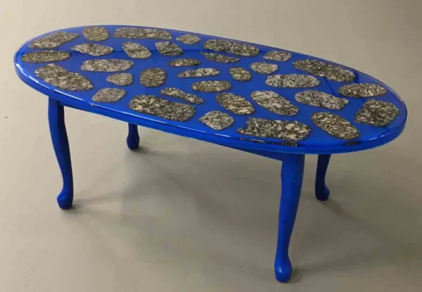Oval coffee table in blue anodized paint