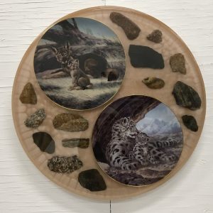 Red Wolf and Snow Leopard collector plates in resin